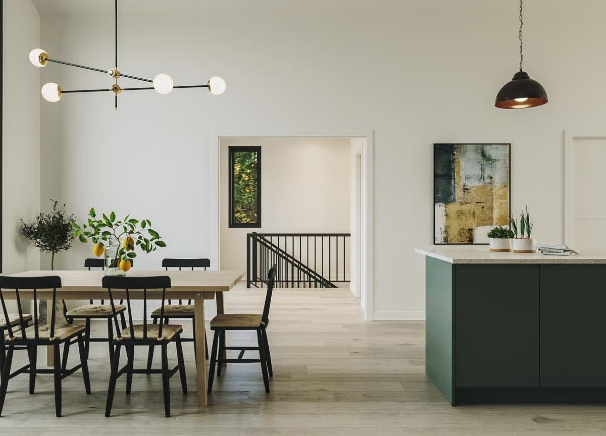 Matte Black Chairs and a Forest-Green Island Share the Room Without Fighting