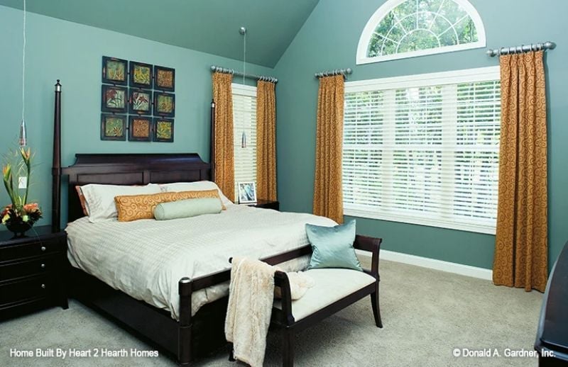 Teal Walls and Gold Curtains Pull Off a Color Pairing Most Rooms Can't
