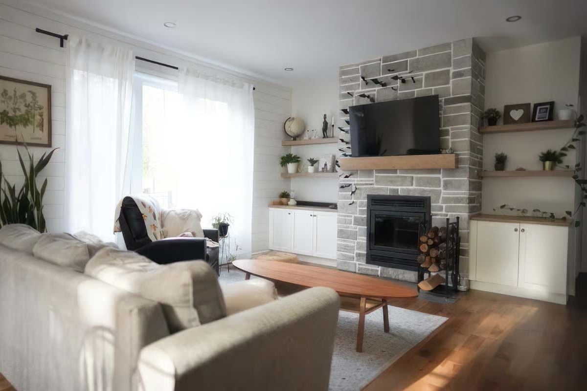 Stone, Wood, and Open Shelves Built Around a Fireplace That Actually Gets Used