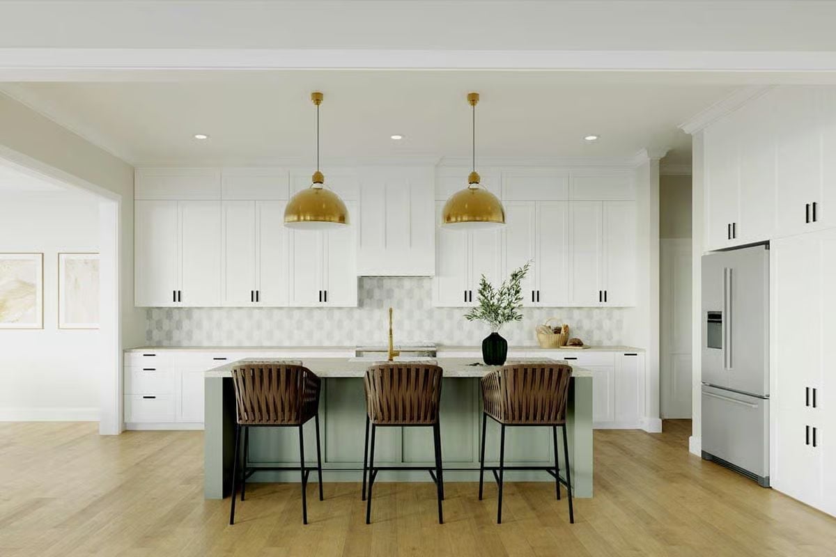 Gold Pendants and a Sage Island Rewrite the Rules on All-White Kitchens