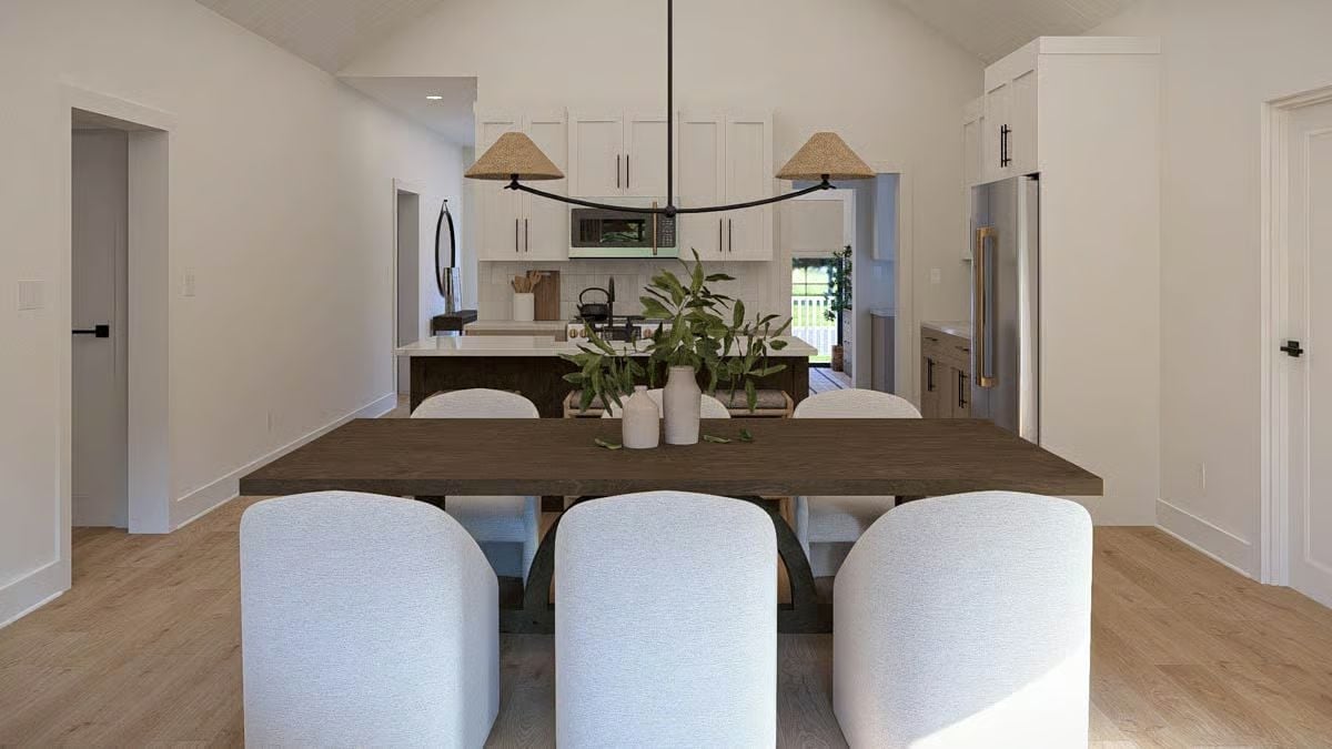 Barrel-Back Dining Chairs and a Dark Wood Table That Ground the Whole Room