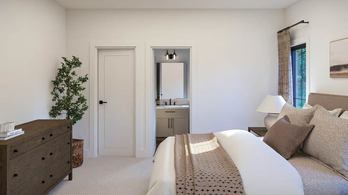 Carpet, a Wood Dresser, and an En Suite That Doesn't Hide Behind a Door