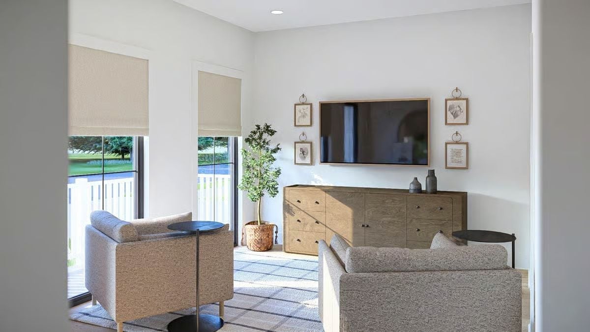 Linen Chairs, a Low Sideboard, and Framed Art That Knows Its Place
