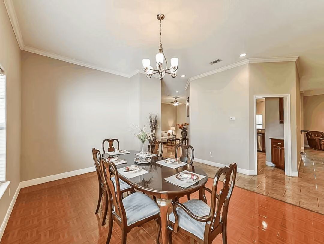 Queen Anne Chairs and a Chandelier That Actually Earns Its Place at the Table