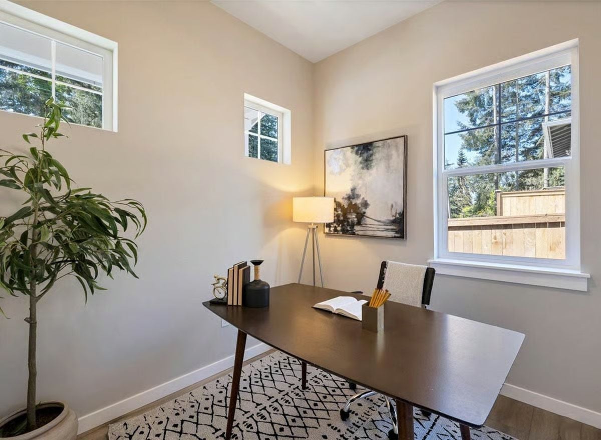 Mid-Century Desk, Tripod Lamp, and One Good Plant Do All the Heavy Lifting