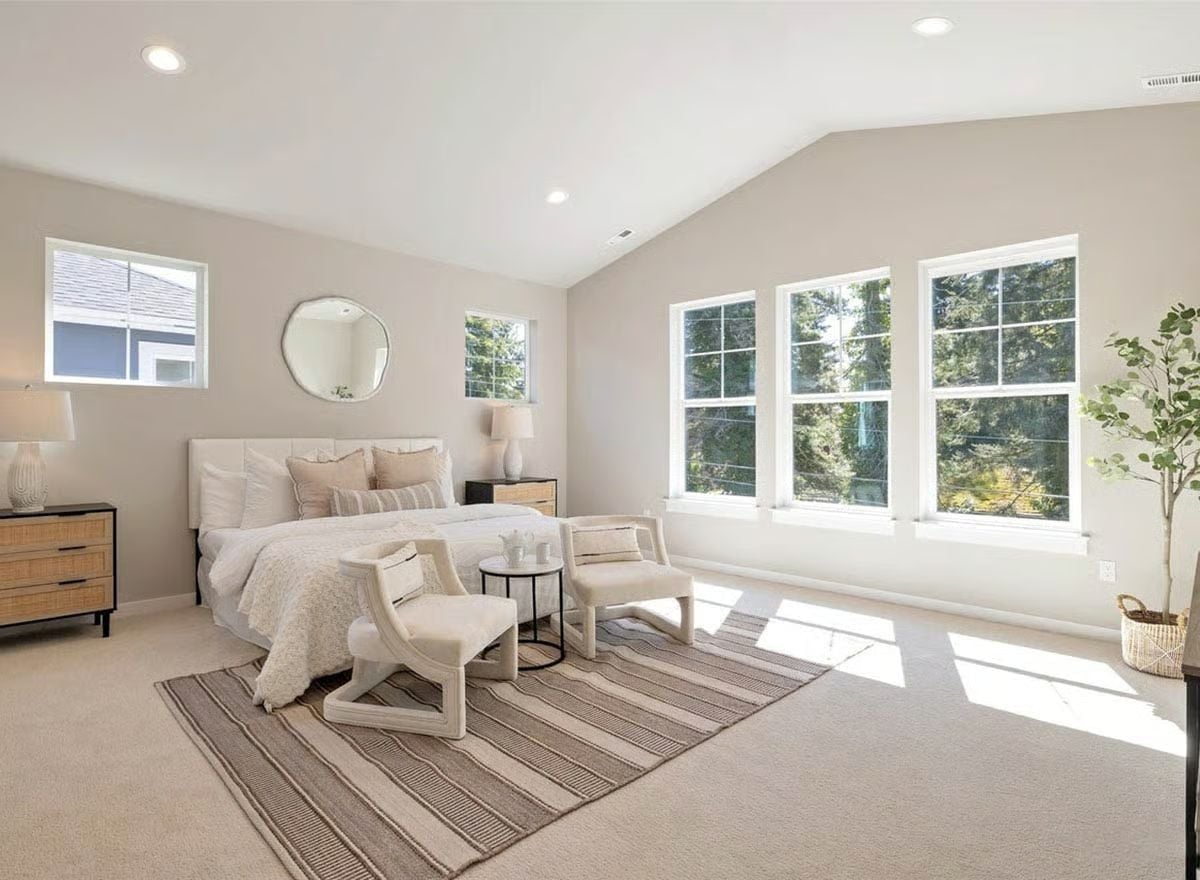 Vaulted Ceiling, Triple Windows, and a Seating Area That Actually Gets Used