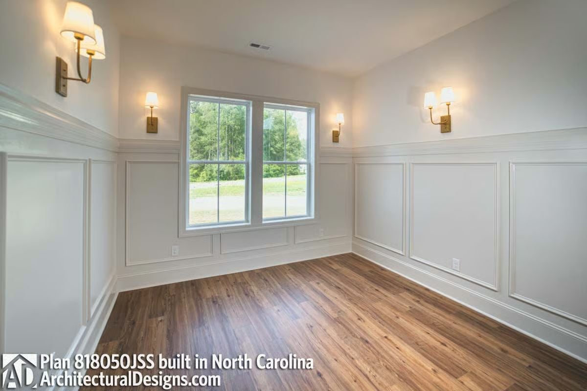Brass Sconces and Board-and-Batten Wainscoting That Mean Business