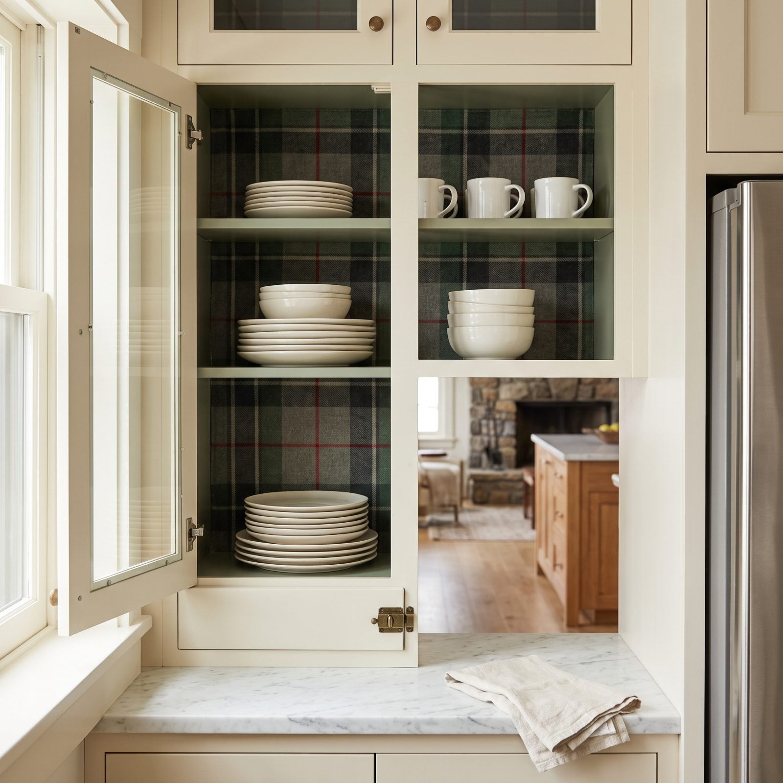 Plaid Fabric Visible Only Inside Open Cabinets
