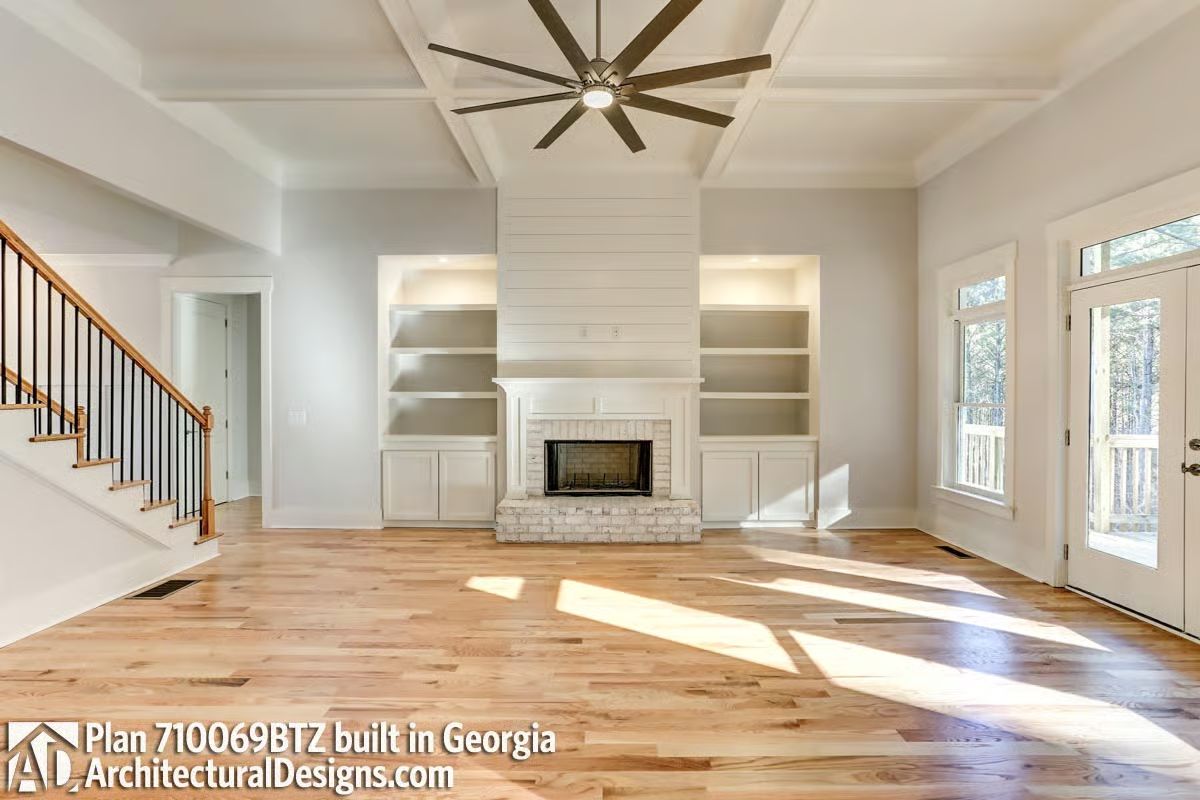Built-Ins on Both Sides of the Fireplace and a Coffered Ceiling That Justifies the Square Footage