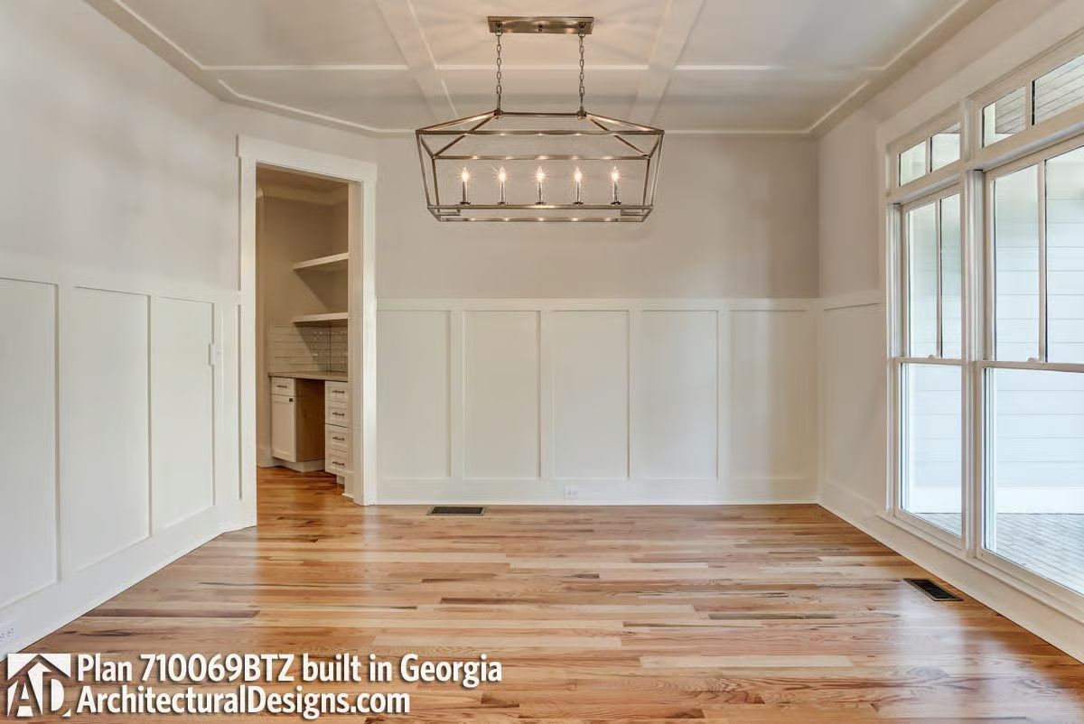 Wainscoting at Chair-Rail Height and a Lantern Light That Earns Its Place