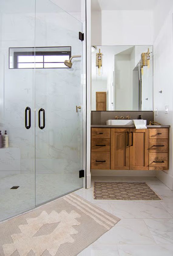 Floating Walnut Vanity and Brass Fixtures Make This Bathroom Worth Every Dollar Spent