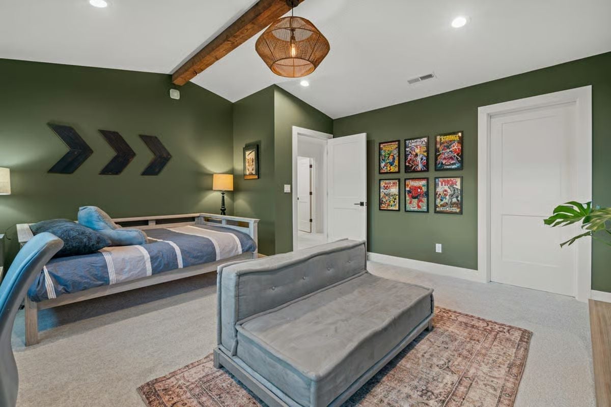 Marvel Posters, Exposed Beams, and Green Walls That Actually Work for a Kid's Room