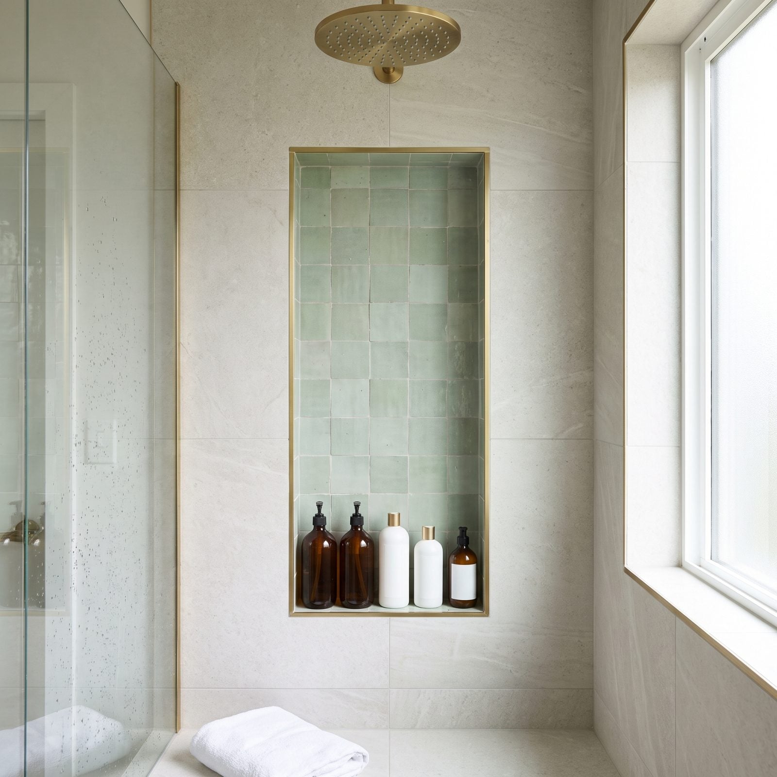 A Recessed Shower Niche Built for Full-Size Bottles
