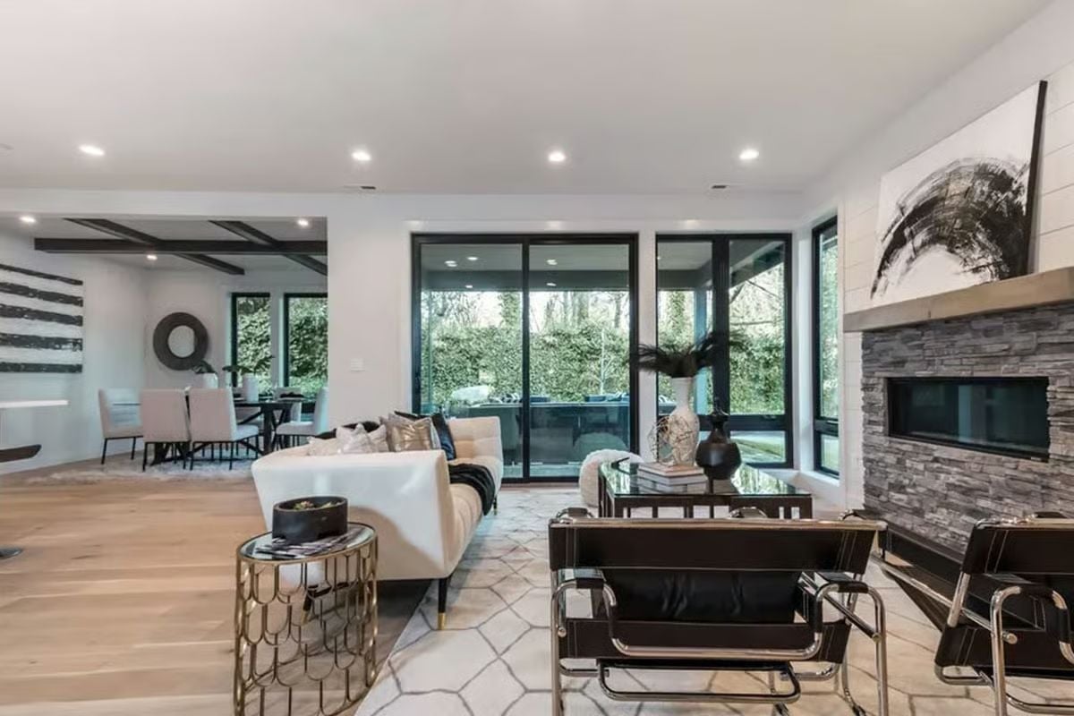 Chrome-Frame Chairs and a Stone Fireplace Pull the Sitting Area Together