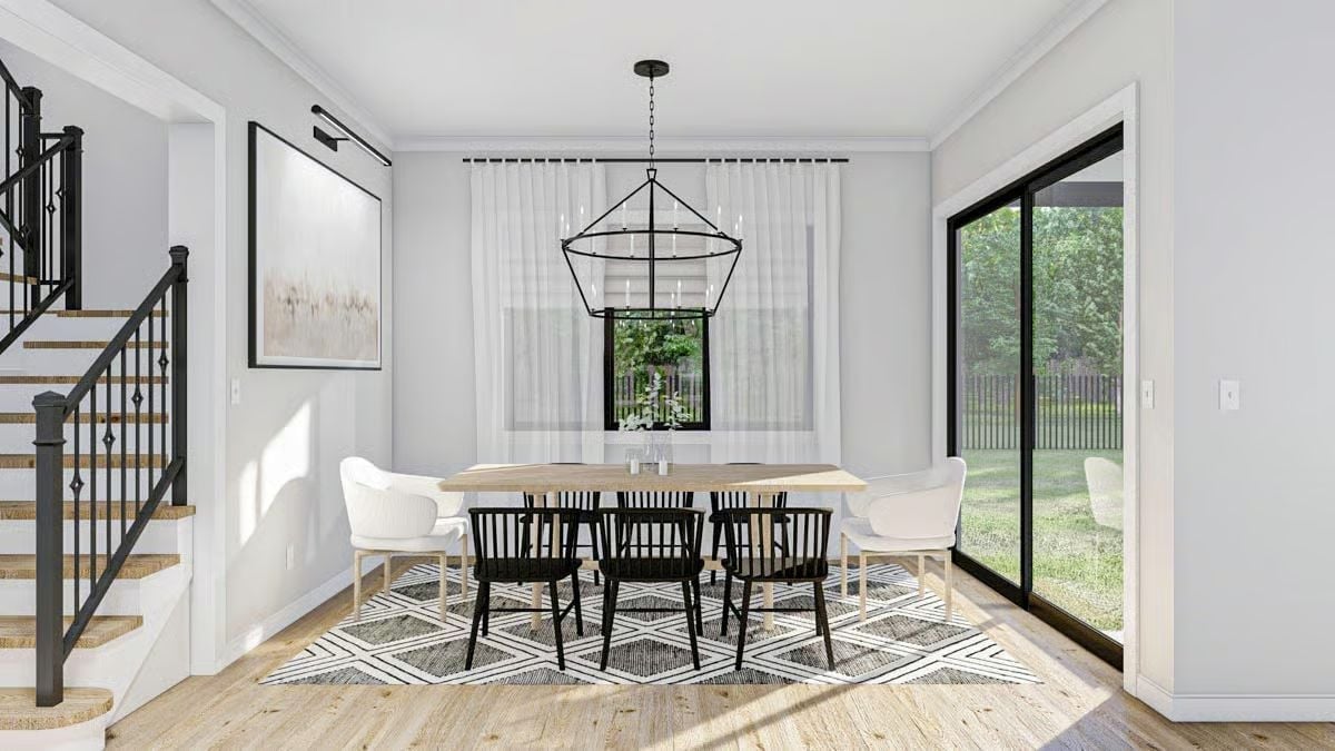 Black Windsor Chairs Against White Upholstered Ones Is a Contrast Worth Stealing