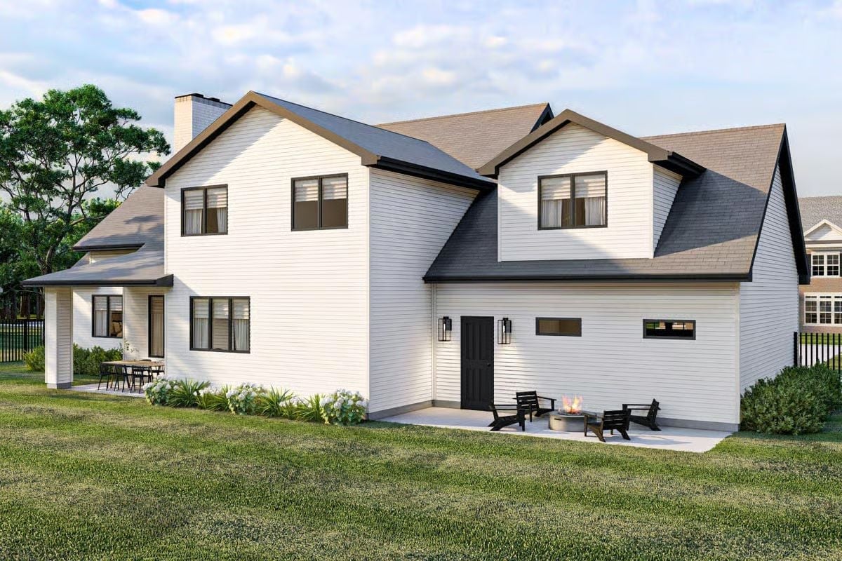 Crisp White Siding, Dark Trim, and a Fire Pit That Actually Gets Used