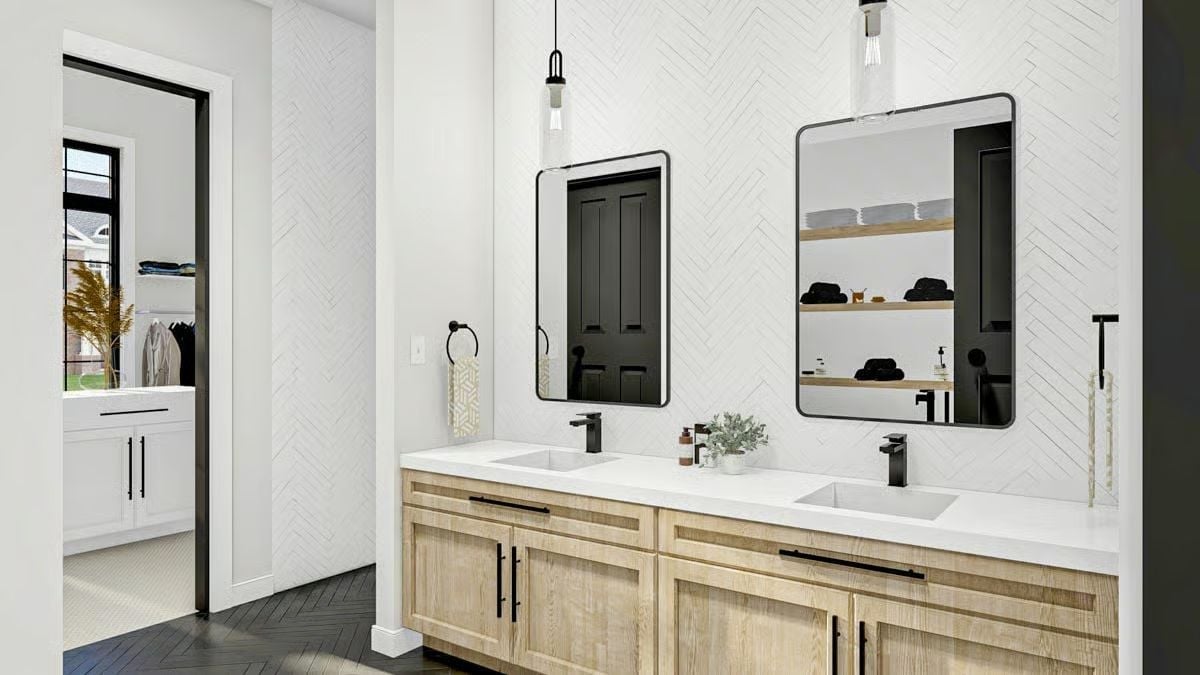 Herringbone Tile, a Double Vanity, and Hardware That Commits to Black