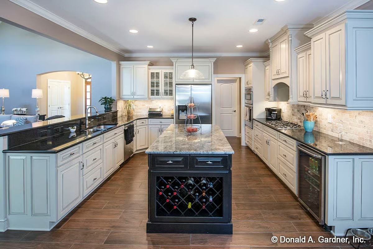 Built-In Wine Rack Below a Granite Island That's Actually Doing Work