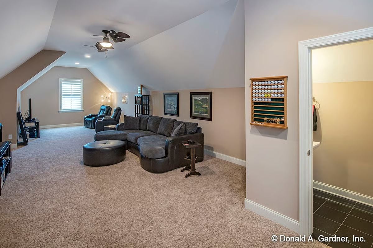 Golf Ball Display Case and a Sectional That Seats Everyone Without Crowding the Room