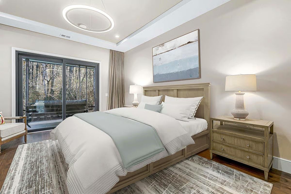 Circular Pendant and Sliding Glass Doors Give This Bedroom Two Reasons to Look Up