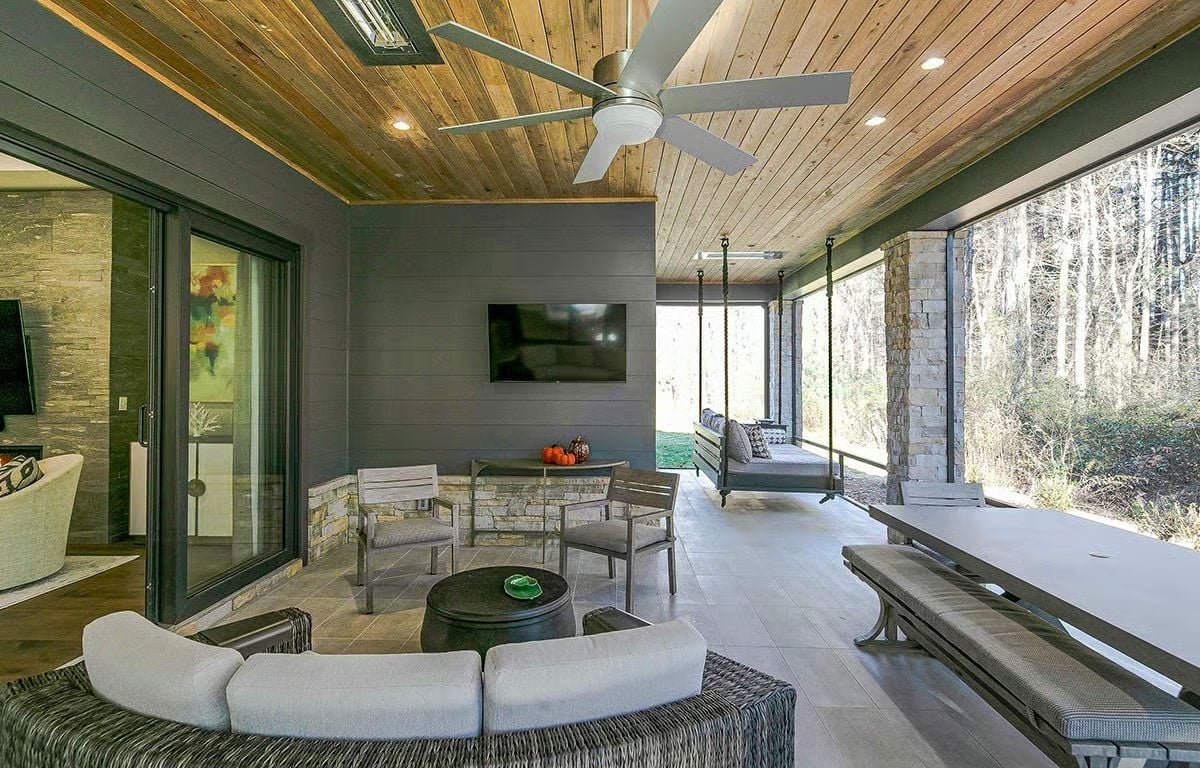 Covered Lanai with Wood Ceiling and Swing Bed Earns Every Square Foot