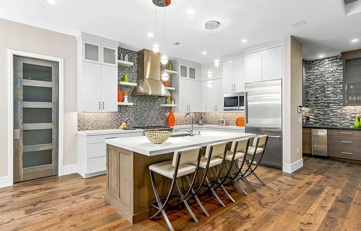 Patterned Backsplash and Pendant Drops Make This Kitchen Feel Alive