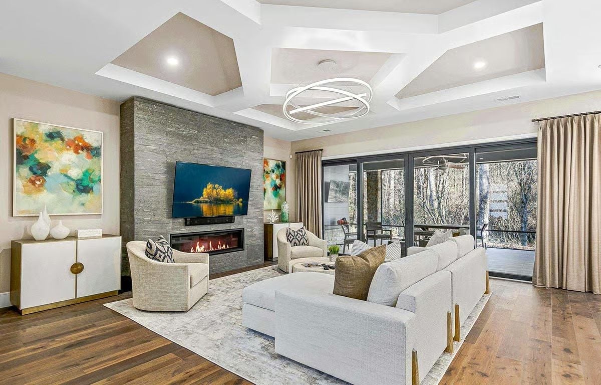 Stacked Stone Fireplace Wall Anchors a Living Room Built for Real Life