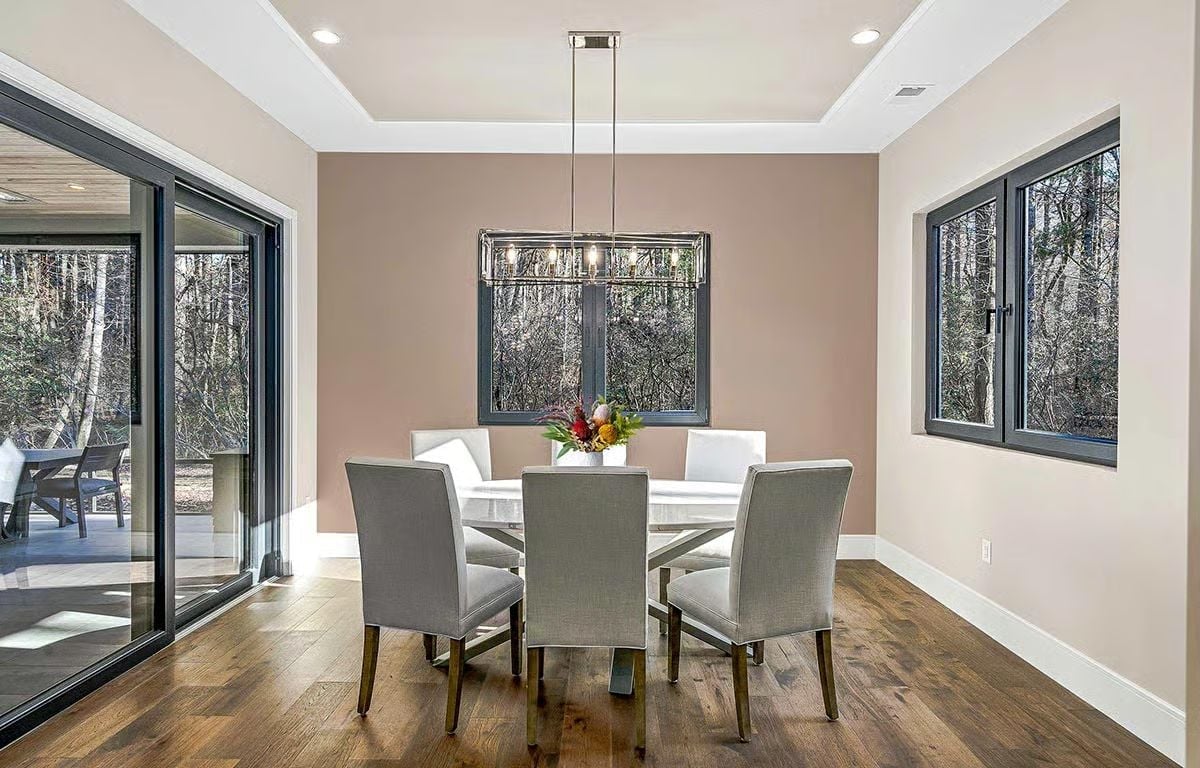 Warm Blush Walls and a Rectangular Chandelier Set the Tone for Dinner