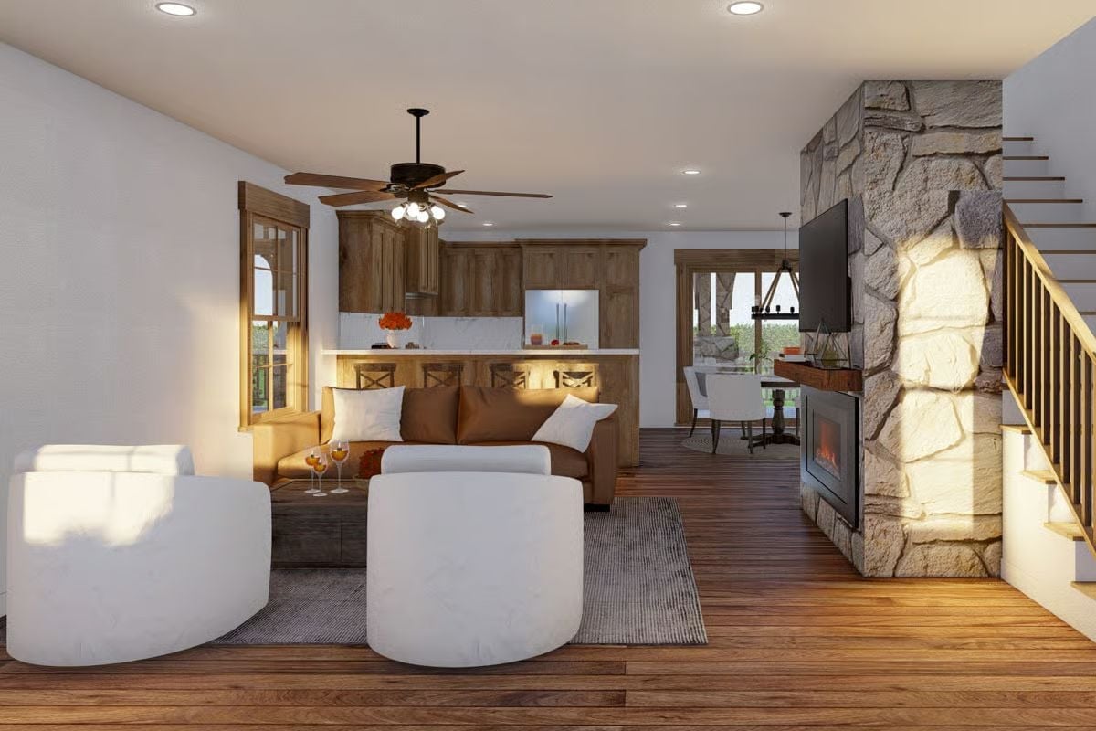 Reclaimed Wood Floors and a Stone Fireplace Column That Earns Its Square Footage