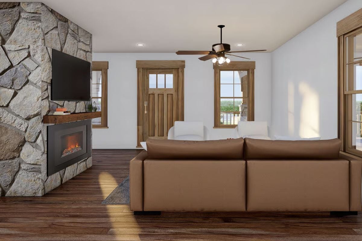Stone Wall, Leather Sofa, and a Fireplace That Actually Gets Used