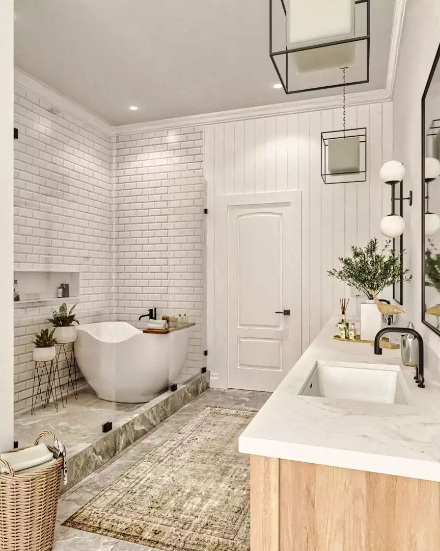 Freestanding Tub on a Raised Platform, Subway Tile, and Warm Wood Done Right
