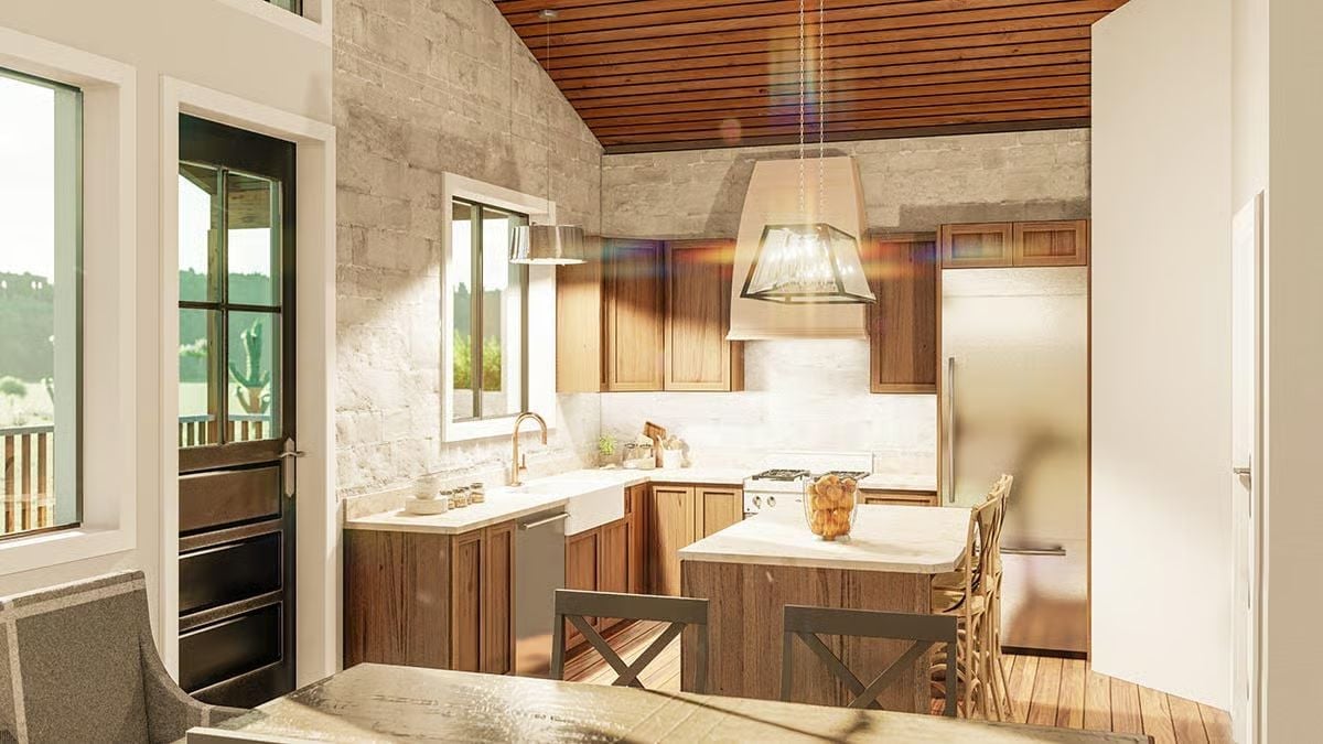 Warm Wood Cabinets and Stone Walls That Make a Kitchen Feel Like a Retreat