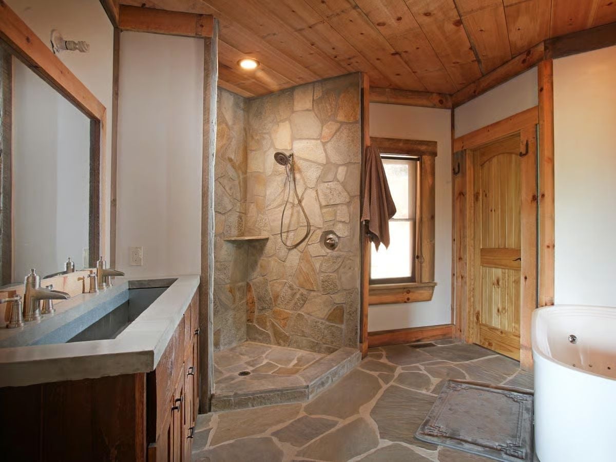 Flagstone Floor and Natural Stone Shower Walls Earn Their Rustic Reputation