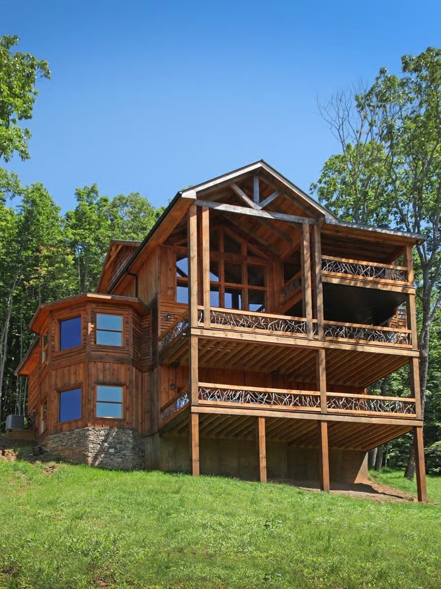 Stacked Covered Decks Make Every Level Feel Like a Treehouse Perch