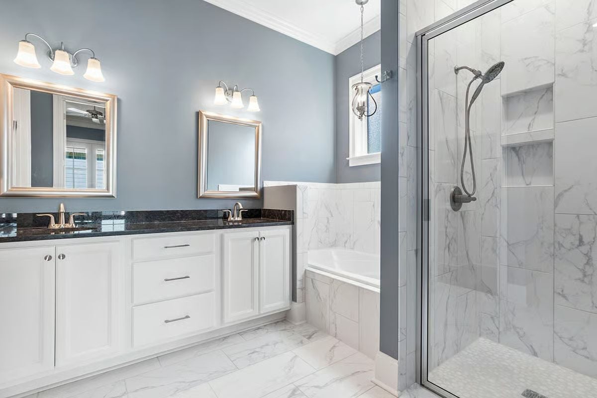 Marble Tile, a Soaking Tub, and Two Sinks That Don't Have to Share