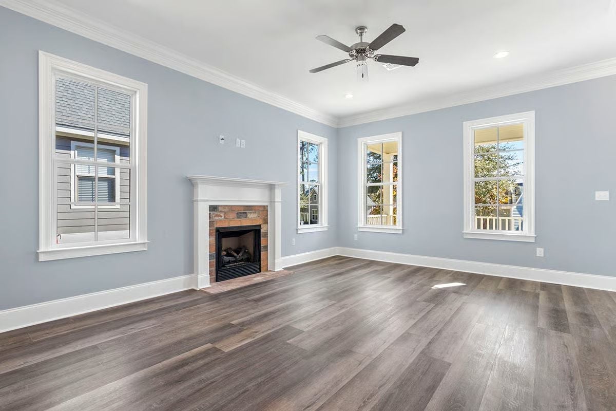 Pale Blue Walls and a Brick Fireplace That Actually Gets Used