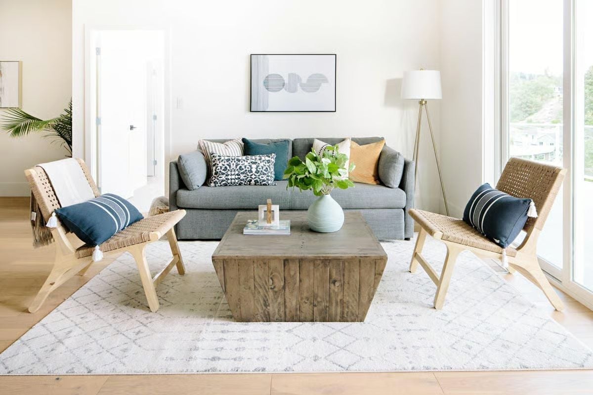 Woven Chairs, a Chunky Wood Block, and Pillows That Actually Make Sense Together