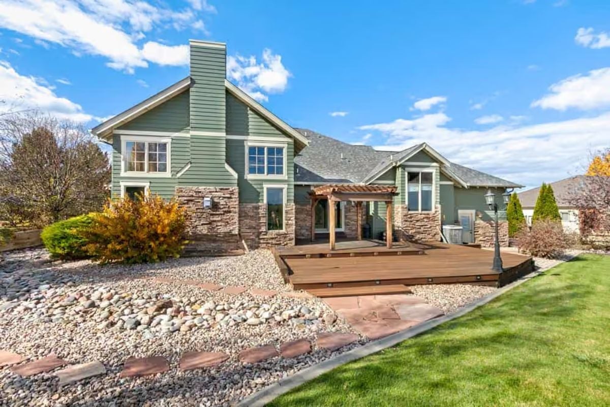 Sage Green Siding and a Pergola Deck That Actually Earns Its Square Footage
