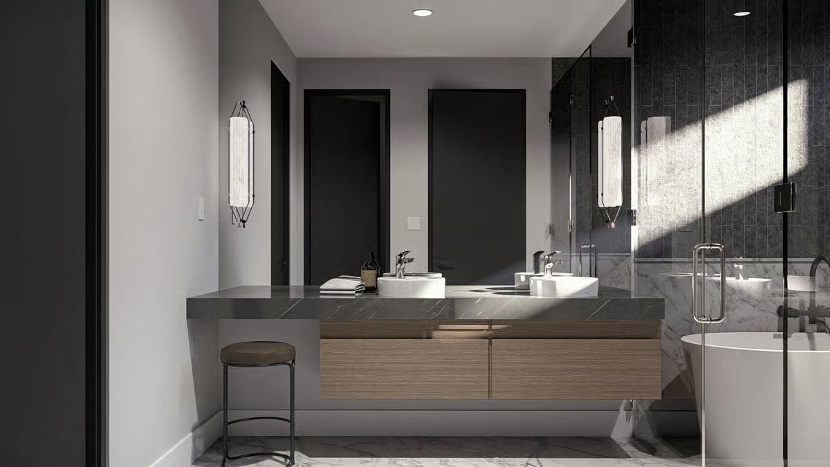 Marble Counter, Wood Vanity, and Sconce Lighting That Earns Its Keep