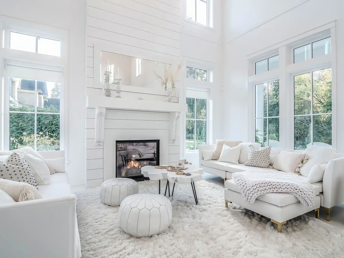 Shiplap Surround, Gold Legs, and a Fireplace That Anchors Every Seat in the Room