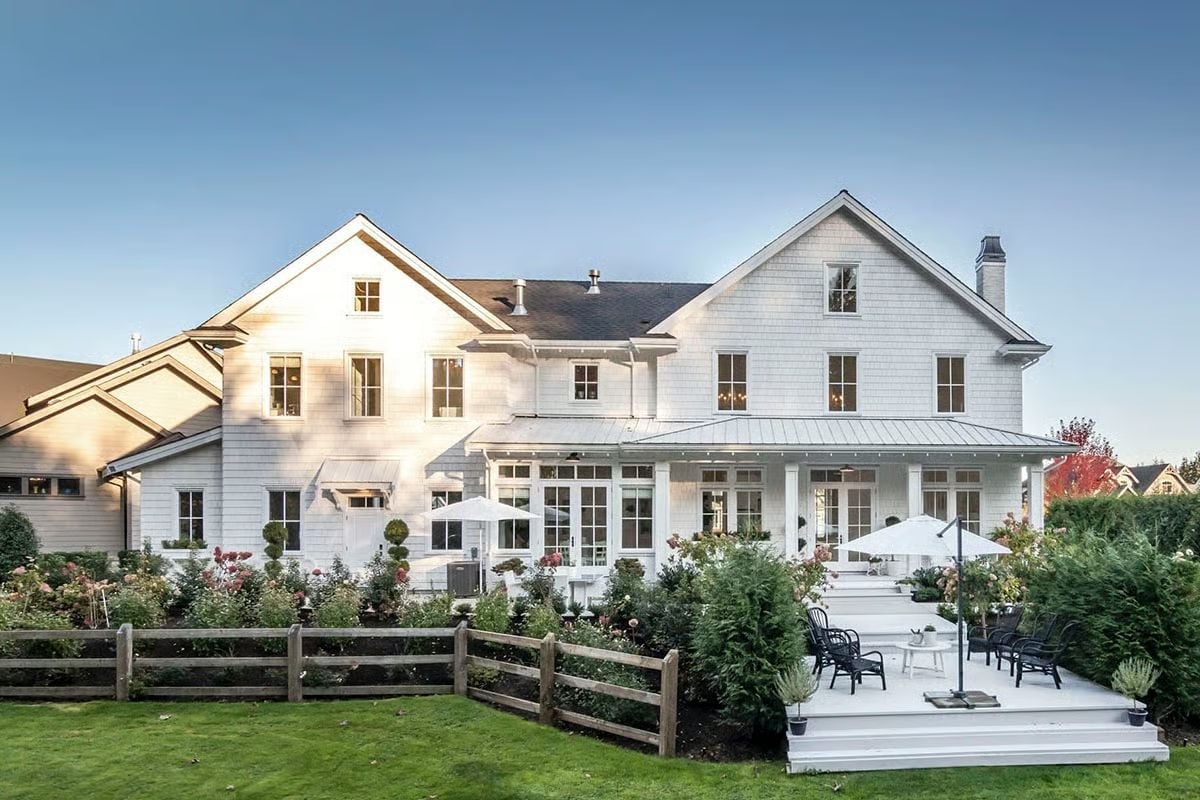 White Shingle Exterior Built Around the Backyard, Not Away From It