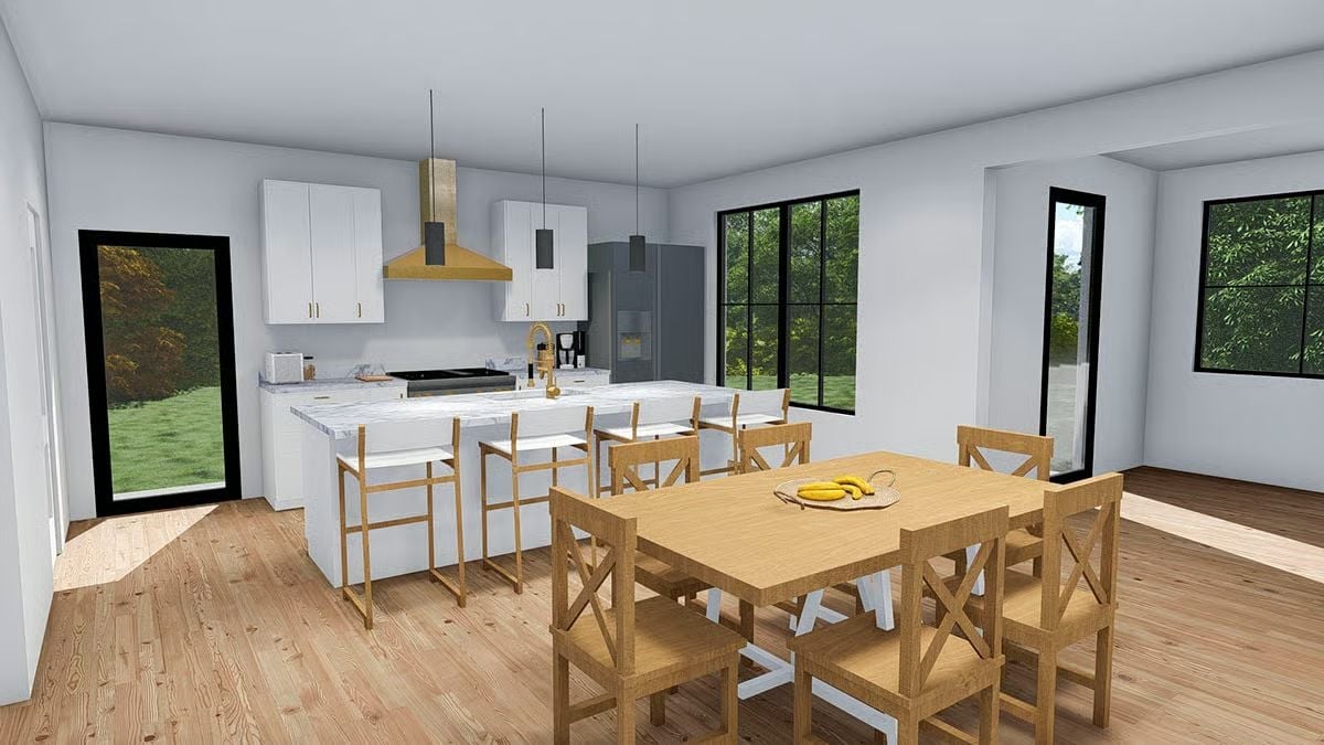 Gold Hardware and a Marble Island Pull the Kitchen and Dining Room Together