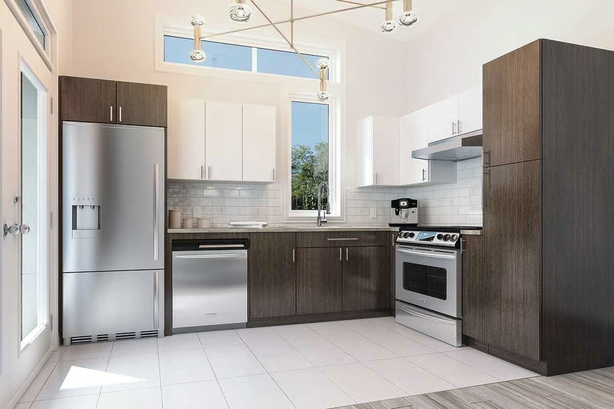 Stainless Appliances and Two-Tone Cabinets Give This Kitchen Real Personality