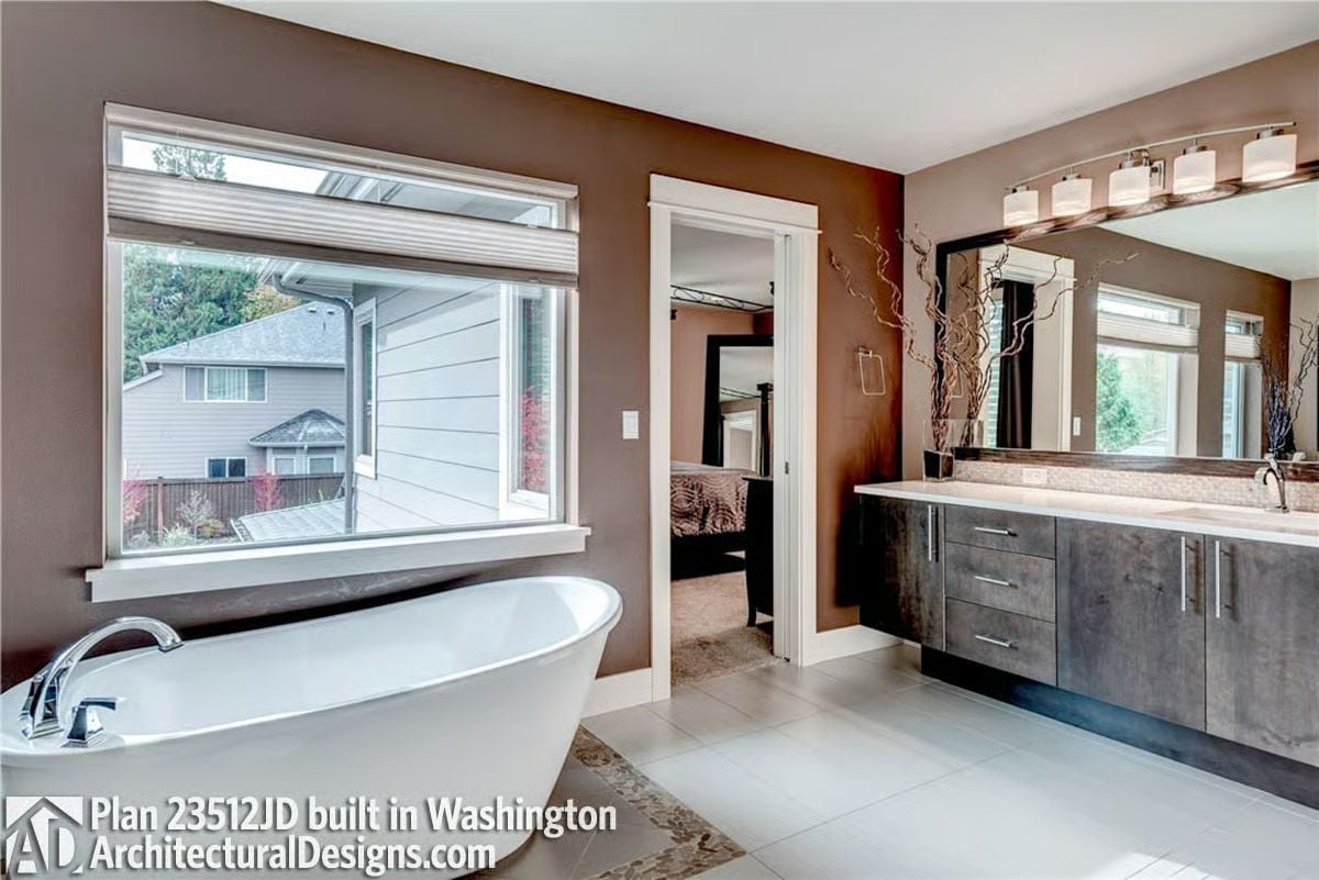 Freestanding Soaker Tub Positioned Where the View Does the Work