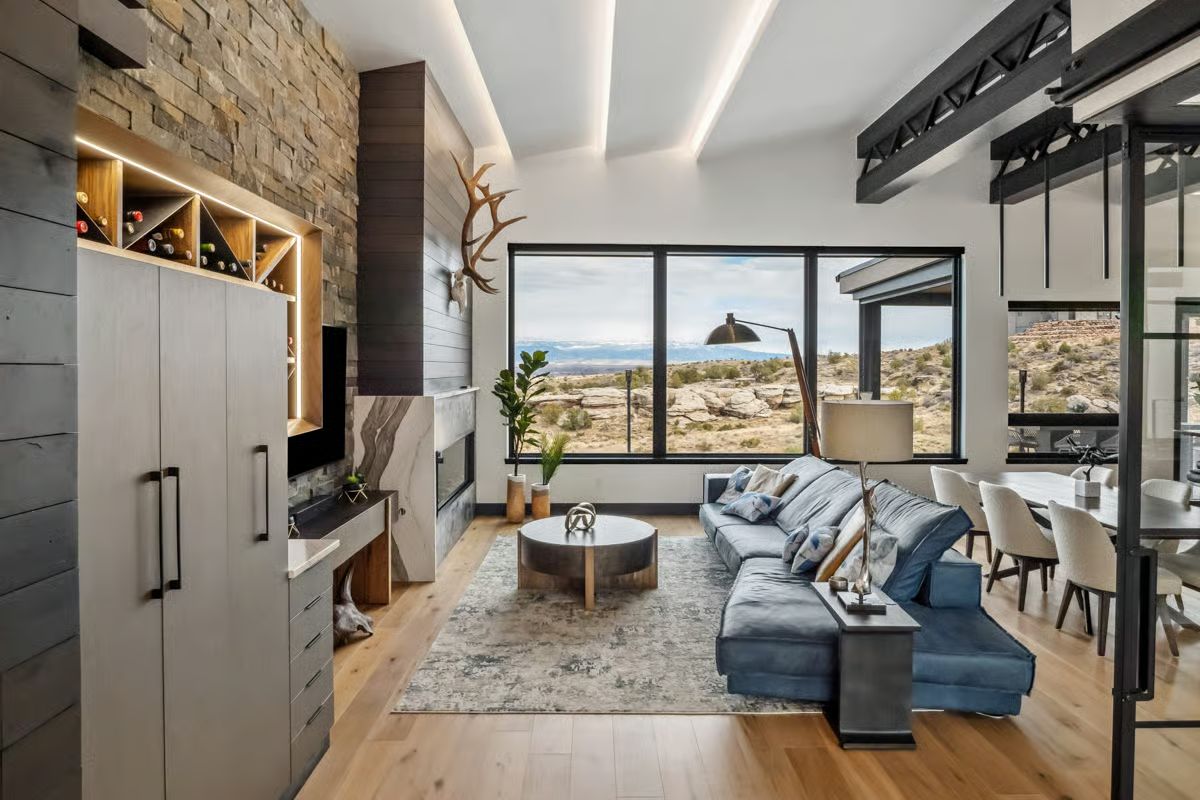 Antlers, Stone, and a View That Earns Its Place Above the Sofa