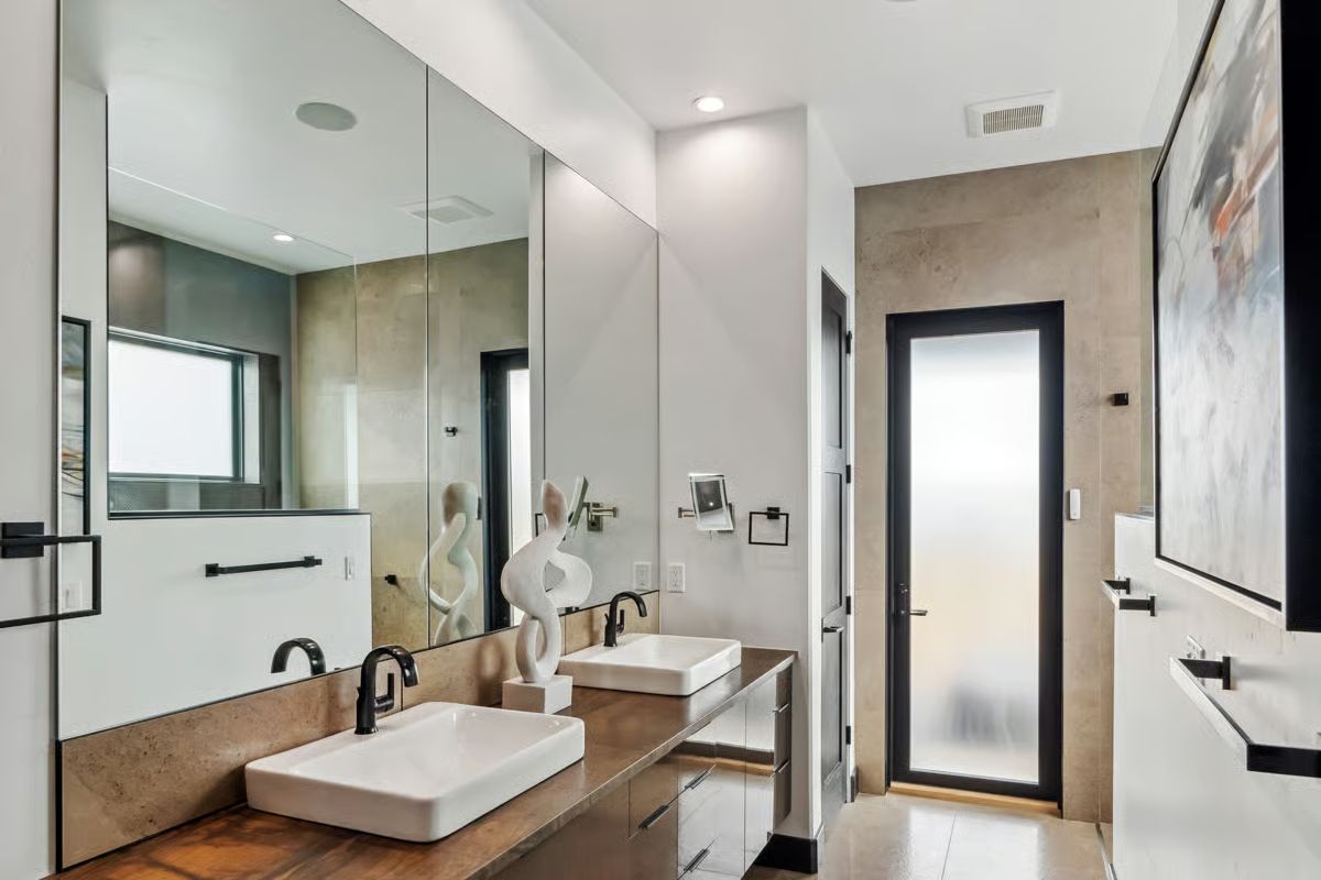 Vessel Sinks, Walnut Counters, and a Sculpture That Holds Its Own