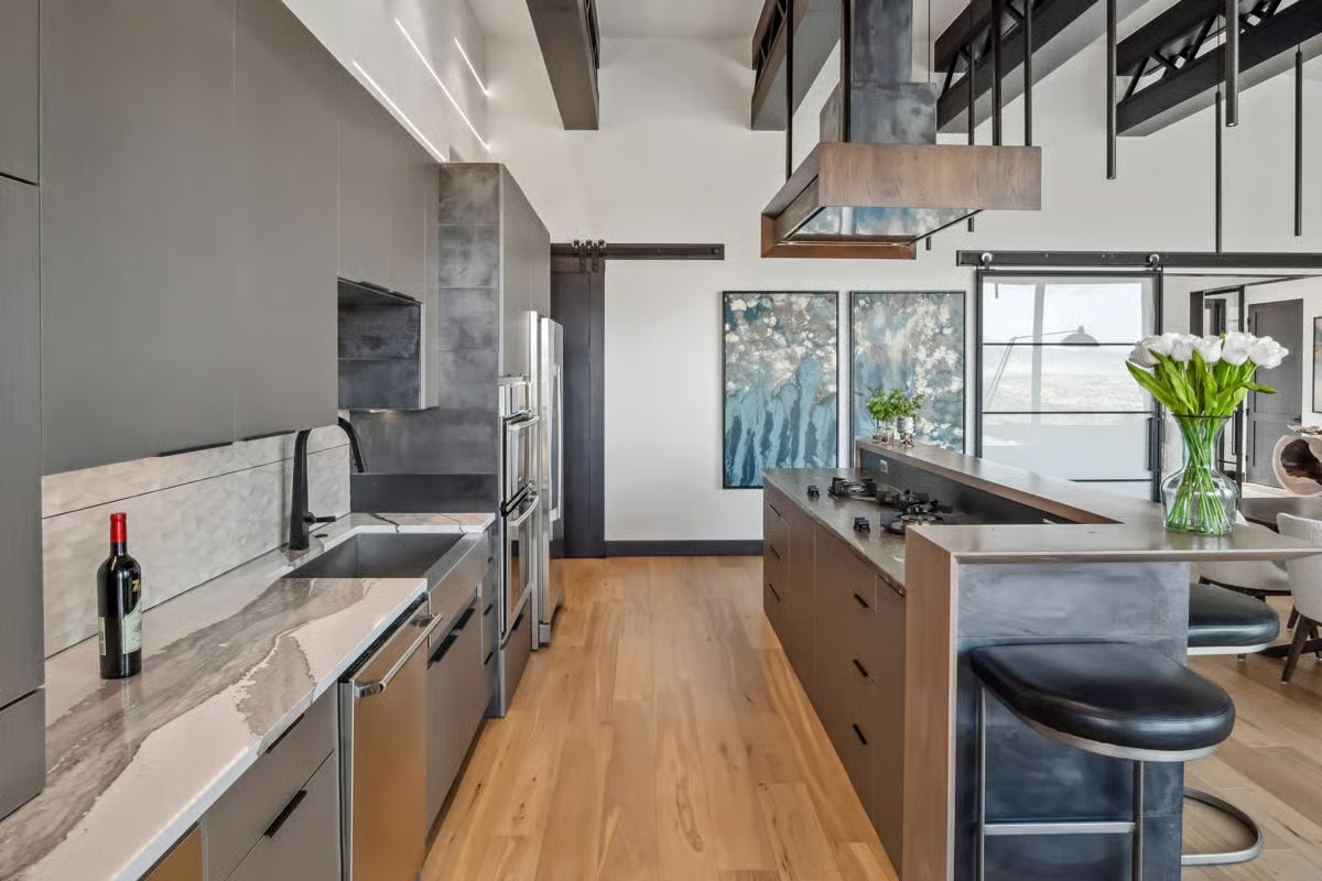 Waterfall Edge, Off-Center Faucet, and a Kitchen That Means Business