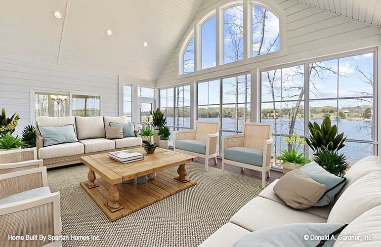 Screened Porch Living With a Waterfront View That Pulls All the Weight