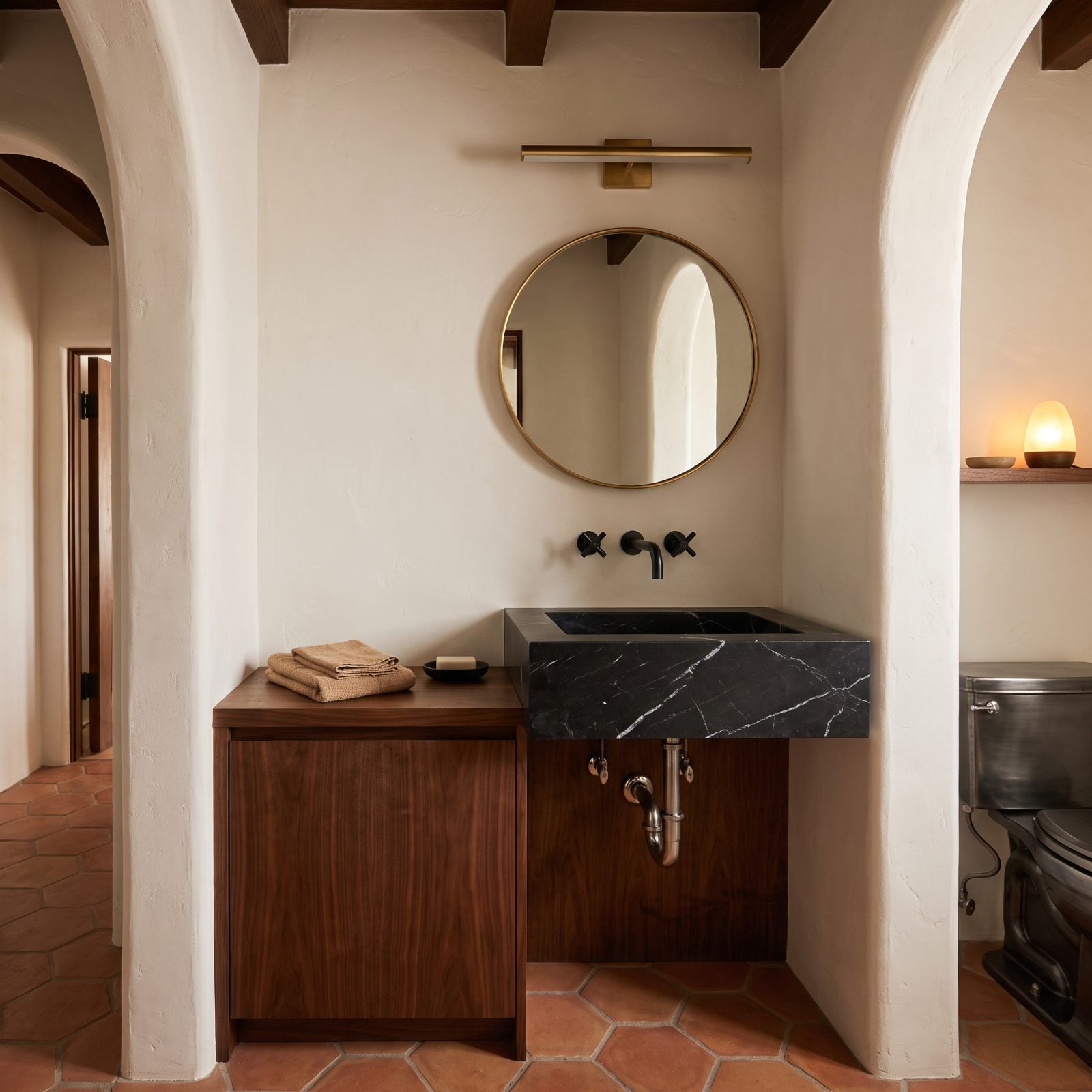 Split-Level Walnut Vanity With a Raised Marble Hand-Wash Block