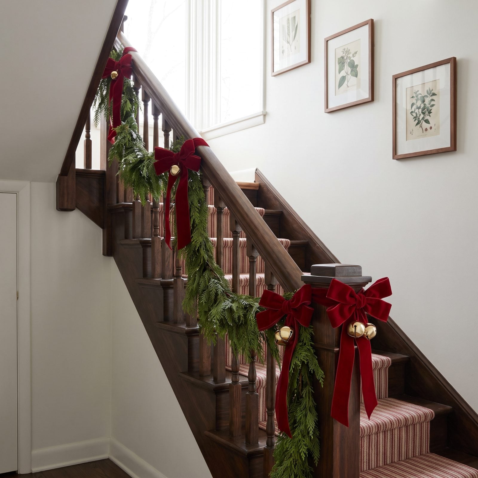 A Staircase Marked by Red Ribbon and Brass Bells